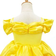 The Belle Deluxe Princess Inspired Dress is the perfect choice for little girls who love to dress up and play princess. This short sleeve yellow dress is inspired by the classic Kids Princess and is sure to delight any fan of the tale. Suitable for ages 3 to 8 years, this Belle dress is the perfect choice for birthdays, dress-up play, or as a special gift.Crafted with care and attention to detail, this Princess Belle dress features a beautiful skirt with a gentle flare, while the bodice is adorned with delicate embellishments. The Belle toddler dress is designed to make your little one feel like a real-life princess and is sure to bring a smile to their face.Whether it's for a Kids Princess-themed birthday party or just a day of imaginative play, this Belle girls dress is the perfect choic Birthdays Dress, Yellow Princess Dress, Belle Dress Up, Princess Belle Dress, Belle Birthday, Belle Costume, Belle Dress, Girls Dress Up, Princess Belle