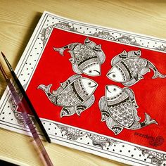 a drawing of three fish on a red background