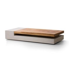 two wooden trays sitting on top of each other in front of a white background