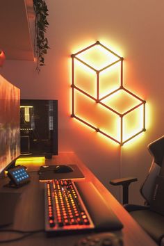 Orange Gaming Room Setup with Geometric Smart LED Lights Pc Gaming Room Setup, Minimalist Gaming Setup, Pc Gaming Room, Gamer Room Design, Soft Vibe, Orange Led Lights, Hue Lights, Video Game Rooms