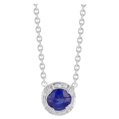 Sapphire and diamond necklace. GIA round sapphire and pave diamond halo pendant necklace. 16 inch platinum cable chain. Sapphire is certified simple heat only. 1 round gem blue fine Sapphire, approx. total weight .88cts, VS, 6.15 x 6.10ct, 39mm, GIA certificate # 5151412600, natural color simple heat only 33 full cut diamonds, approx. total weight .15cts, G, VS2 Platinum 5.8 grams Tested and stamped: pt 950 Chain: 16 inches Chain width: 1mm cable chain Center section width: 8.5mm Top to bottom: Cornflower Blue Sapphire, Platinum Pendant, Round Sapphire, Blue Sapphire Diamond, Halo Pendant, Cornflower Blue, Diamond Halo, Sapphire Diamond, Halo Diamond