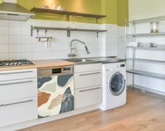 a washer and dryer in a small kitchen