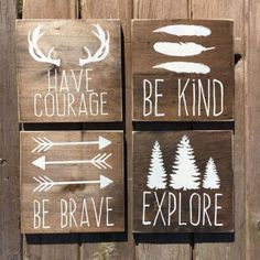 three wooden signs that say be brave, i have courage, be kind and explore