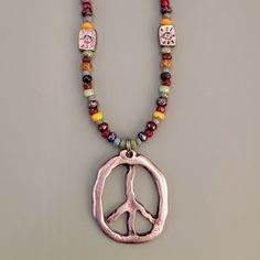 Handmade Boho necklace with multicolored Picasso glass beads and a large pewter peace sign and pewter accents. Peace Necklace, Boho Beautiful, Free Spirit Style, Handmade Boho, Flower Child, Peace Sign, Boho Necklace, Washer Necklace, Glass Beads