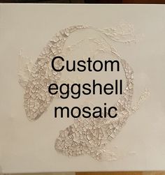 a sign that says custom eggshell mosaic