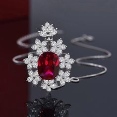 "Luxury Cz Red Stone Flower Shape Necklace For Women, Ha4548 Length : 18 Inch Jewelry Main Material: Brass Main Stone: Cubic Zirconia Occasion: Anniversary, Engagement , Gift, Party, Wedding Gender: Women's " Ruby Pendant, Writing Gifts, Geometric Pendant, Red Stone, Box Chain, Flower Shape, Necklace For Women, Gemstone Necklace, Heart Pendant