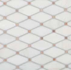 a white and brown tiled wall with small squares