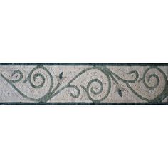 a decorative tile border with swirls and scrolls on it's edges, in grey tones