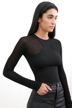 Yada Top Fitted Modern Tank Top, Chic Seamless Tops For Night Out, Trendy Fitted Top With Mesh Back, Sleek Tops With Seamless Construction, Modern Fitted Tank Top, Versatile Fitted Racerback Top, Modern Tops For Night Out, Fitted Modern Black Tank Top, Modern Stretch High Neck Tops