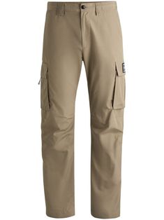 beige front button and zip fastening elasticated waistband belt loops two side cargo pockets two rear welt pockets logo patch to the rear Blue Pants Men, Pastel Brown, Light Blue Pants, Ripstop Fabric, Balenciaga Triple S, Custom Watch, Fitted Trousers, Short Suit, Cargo Trousers