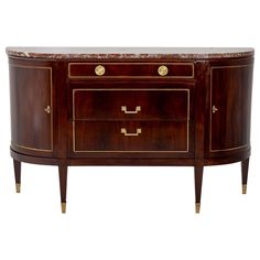 a wooden sideboard with two drawers and marble top