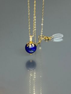 This pendant necklace showcases a natural Royal blue Lapis Lazuli pendant with a stunning deep blue color. The pendant is adorned with a beautiful 14K gold-filled flower cap, and it's gracefully strung on either a 14K gold-filled or Sterling Silver chain, making it versatile for layering with other necklaces or as a striking stand-alone piece. The necklace exudes a luminous and sparkly quality, ensuring you'll shine brilliantly when wearing it.  * Quality: High-quality lapis sphere * Stone Shape January Birthstone Jewelry, Natural Gemstone Necklace, Lapis Lazuli Jewelry, Lapis Lazuli Pendant, Lapis Lazuli Necklace, Types Of Gemstones, Anniversary Gifts For Wife, Anniversary Gift For Her, Wow Products