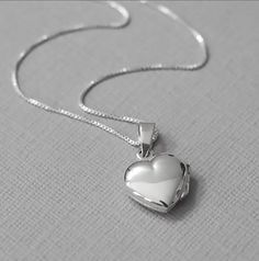 "Sterling Silver Necklace Necklace, Sterling silver heart pendant on fine sterling silver box necklace chain.  Locket Size: 12mm Inner heart measurement: 7mm.  Please see succeeding photos for size reference OTHER HEART NECKLACES IN THE STORE: https://www.etsy.com/shop/alexandreasjewels/search?search_query=HEART+NECKLACE Necklace default length: 18 inches.  Available in different sizes - please see sizing guide and indicate preference in the \"Add your personalisation\" box. MULTIPLE QUANTITIES: Chain Locket, Necklace Girlfriend, Silver Heart Locket, Sterling Silver Initial Necklace, Promise Necklace, Silver Locket Necklace, Meaningful Necklace, Heart Necklaces, Box Necklace