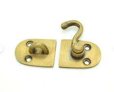 two brass plated handles on white background