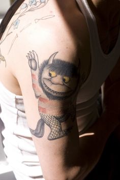 a person with a tattoo on their arm