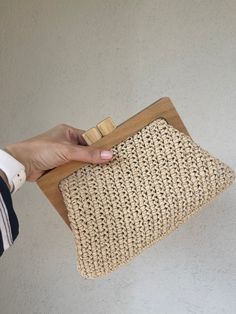 Crochet Bag,Raffia Straw Clutch Purse ,Straw Handbag,Hand Woven Bag, Luxury Crochet Bag Handmade wooden knitted bag for women- gifts for her ⭐️ You will love this handmade crochet bag ⭐️ A complete complement that you can use anytime, anywhere, day or night. ⭐️ Wood scholarship. ⭐️ Lined, non-stretch The inside of the bag is spacious, you can easily carry your personal belongings. Features and materials of this part: Raffia Yarn, Wooden Burs, lined Width: 35 cm ( Centimeters ) Length: 18 cm ( Ce Beige Rectangular Crochet Bag With Bamboo Handle, Rectangular Beige Crochet Bag With Bamboo Handle, Rectangular Bag With Bamboo Handle For Gift, Rectangular Bags With Bamboo Handle For Gift, Rectangular Bag With Bamboo Handle As Gift, Natural Bag With Bamboo Handle As Gift, Natural Color Bag With Bamboo Handle For Gifts, Natural Color Bags With Bamboo Handle For Gift, Natural Shoulder Bag With Bamboo Handle As Gift