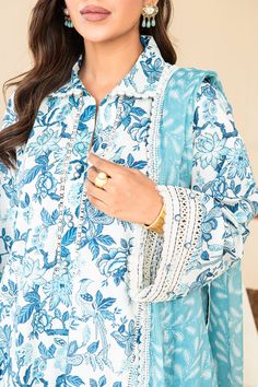 Brand: Faiza FaisalProduct Code: Faiza Faisal Serene - AURORACollection: Faiza Faisal Serene Unstitched Summer Lawn CollectionFabric: Lawn DESIGN DETAILS: Printed Lawn Shirt: 2.4M Printed Chiffon Dupatta: 2.5M Printed Cotton Cambric Trouser: 2M DISCLAIMER:* Lining, Laces, and Tassels are not included in unstitched variants.* Embellishment items in stitched outfits are subject to market availability.* The actual colors of the outfit may vary from the colors being displayed on your device. CARE INSTRUCTIONS: Extra Fabric Has Been Used For Shoot Original Color May Vary Slightly From The Picture Dry Clean Recommended Iron The Clothes At Moderate Temperature Do Not Use Bleach, Or Stain Removing Chemicals Damp Fabric Should Not Be Exposed To Sunlight Faiza Faisal Serene Unstitched Summer Lawn Co Designer Long Sleeve Pant Set With Printed Motifs, Elegant Cotton Sets For Designer Wear, Spring Designer Cambric Sets, Long Sleeve Mulmul Palazzo Set, Cotton Palazzo Set For Wedding, Elegant Blue Mulmul Sets, Traditional Floral Print Cambric Sets, Fitted Naqshi Set Made Of Cambric, Traditional Cambric Sets With Floral Print