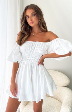 Paradise Puff Sleeve White Dress

This super cute flowy dress is a head turner! Wear it with sandals and a hat on a summer day, or with sneakers on your next lunch date! 

Ruched detail at the top

Lined 

Puff short sleeves 

Square or off the shoulder neckline 

A line shaped skirt 

Elastic around sleeve cuff, bodice and neckline

Mid-weight material with stretch

Mini length Puff Sleeve Dress White, Cute Flowy Dresses, Puff Sleeve Dress, Beginning Boutique, Puffed Sleeves Dress, Flowy Dress, Summer Dresses For Women, Dress White, European Fashion