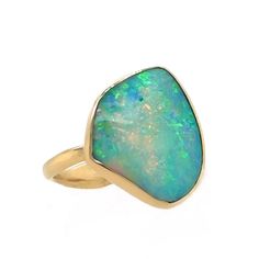 Showstopper. This absolutley stunning Australian Opal is set in 14k yellow gold on Emily's freeform Nestle and in solid gold. It is an incredible piece that will elevate any special occasion oufit! Approximate stone size: 20mm x 17mm Approx ct weight: 4.62cts Mohs Hardness: 5.5-6 This one of a kind piece is handmade in Emily's Hudson Valley studio and currently in stock. If you have questions about sizing, shipping or custom orders please reach out to us! This ring is in stock and currently a si Fine Jewelry Yellow Gold Opal Ring With Polished Finish, Yellow Gold Opal Ring With Polished Finish, Formal 14k Gold Opal Ring With Bezel Setting, 14k Gold Fine Jewelry With Large Stone, Luxury 14k Gold Jewelry With Large Stone, Polished Yellow Gold Opal Ring, 14k Yellow Gold Jewelry With Large Stone, Fine Jewelry 14k Gold Opal Ring With Polished Finish, Fine Jewelry Yellow Gold Opal Open Ring