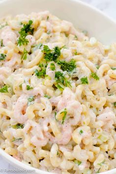 the best shrimp macaroni salad in a white bowl