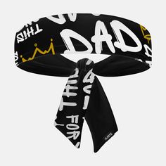 a black and white headband with the words dad printed on it, tied in a knot