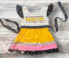 This adorable school themed dress is perfect for back to school! Purchase it with or without the custom name. Multicolor Sleeveless Dress For School, Summer School Mini Dress, Preppy Fitted Dresses For School, Cute Mini Length Dresses For School, Fitted Short Sleeve Dress For School, Fitted Casual Dress For School, Playful Fitted Dress For School, Fun Fitted Dress For School, Fitted Multicolor Dress For School