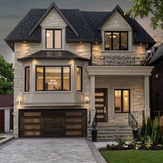 a two story house with a large front yard