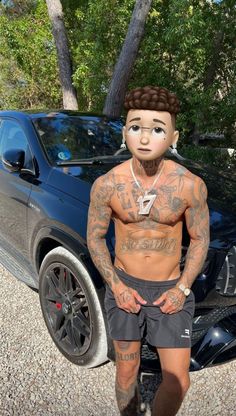 a man with tattoos standing in front of a car