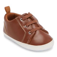 Add these cute boy's sneaker crib shoes from So Adorable to his shoe collection. Made from smooth faux leather, these stylish slip-on shoes have a round toe. Style with tailored pants, shorts, or jeans. Closure Type: Slip-OnShoe Heel Height: FlatUpper/Outer Base Material: 100% PolyuretheneShoe Lining Material: PolyurethaneSole Material Content: 100% PolyurethaneToe Type: Round ToeCare: Spot CleanHeel Style: Flat HeelCountry of Origin: Imported Synthetic Sneakers With Soft Sole, Closed Toe, Synthetic Sneakers With Soft Sole, Soft Sole Synthetic Closed Toe Sneakers, Soft Sole Synthetic Sneakers, Casual Brown Sneakers For Playtime, Brown Lace-up Sneakers With Soft Sole, Brown Leather Sneakers With Soft Sole, Brown Non-slip Sneakers For Spring, Leather Sneakers With Rubber Sole For Playtime