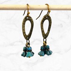 Tiny teal turquoise blue Czech glass flower beads cluster beneath antiqued brass finish oval loops. These Bohemian dangle earrings are fun and lightweight.  Hypoallergenic ear wires (nickel and lead free). Select ear wire style at checkout. Artisan glass beads produced in small quantities in Czech Republic A gift for you or someone special, earrings are carded and in an organza bag. Link back to my shop: https://www.etsy.com/shop/JezaJewelry Boho Flower Cluster Dangle Earrings - Czech Glass Earr Boho Beaded Earrings, Special Earrings, Flower Cluster, Handmade Earrings Beaded, Teal Turquoise, Turquoise Glass, Flower Beads, Glass Flowers, Glass Earrings