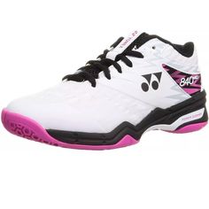 a white and black tennis shoe with pink accents