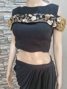 This package includes embroided off shoulder  top  which can be wear with any skirt or lehenga . Blouse is made in  silk fabric with zardozi embroidery. We will collect your measurements as soon as you book the dress. Please convo for more queries. can be customize in any size or color of your choice. Festive Off-shoulder Sets For Reception, Festive Off-shoulder Reception Sets, Festive Off-shoulder Party Sets, Embroidered Top With Traditional Drape For Reception, Embroidered Tops With Traditional Drape For Reception, Bollywood Style Traditional Drape Evening Tops, Reception Tops With Traditional Drape And Mirror Work, Semi-stitched Art Silk Party Blouse, Party Wear Top With Traditional Drape For Reception