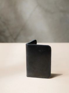 Introducing the ABLE Freddie Card Wallet in sleek black leather. Stay organized and stylish with this functional yet fashionable wallet. Perfect for keeping your cards and cash in one place on-the-go. The Freddie Card Wallet - Modern Bifold Card Holder With Interior Slots, Modern Wallets With Rfid Blocking For Daily Use, Black Bifold Wallet For Everyday Use, Modern Bifold Wallet With Hidden Phone Sleeve, Modern Trifold Card Holder For Daily Use, Black Trifold Wallet With Coin Pocket For Daily Use, Black Trifold Wallet With Coin Pocket For Everyday, Black Bifold Wallet With Interior Card Slots, Black Bifold Wallet For Daily Use