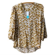 New Stitch Fix Gold Cream Floral Ruffle Neck 3/4 Sleeve Blouse Size M Cottagecore Top Like An Item But Not The Price? Send Me An Offer Buy With Confidence, I Am A 5 Star Seller, Poshmark Level Ii Ambassador With Many Happy Customers All Items Are From My Personal Closet, New With Tags Or Like New & Well Cared For Look For Closet Clear Out Days Bundle 2 Or More Items For Best Deals And Discounts To Save Not On Poshmark? Use My Code: Marleymaggiemae To Receive A *$10 Credit From Poshmark When You Spring Rayon Top With Split Neck, Fall Floral Print Viscose Blouse, Floral Print Viscose Blouse For Fall, Relaxed Fit Floral Print Viscose Blouse, Relaxed Fit Viscose Blouse With Floral Print, Fall 3/4 Sleeve Rayon Tops, Spring 3/4 Sleeve Rayon Blouse, Fall Rayon Tops With 3/4 Sleeves, Spring Viscose Blouse In Relaxed Fit