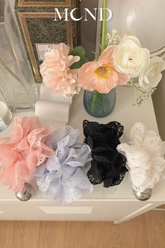 Introducing the Jubilee Hair Scrunchie - a carefully crafted blend of style and comfort, handmade just for you. This medium-sized accessory boasts an ornate punchwork lace design that exudes femininity and graceful charm. Perfect for pairing with your summer ruffle dresses or everyday ensembles, this scrunchie is a must-have.

You may find some loose threads on the edge, but we intentionally chose this finishing style, so please don't consider it as a defect. We appreciate your understanding, and if you have any inquiries, we're always here to help. 

Details:
- Lace diameter: approximately 11cm
- Inner band diameter: approximately 3cm Ruffle Dresses, Design Hair, On The Edge, Lace Design, Hair Tie, Kawaii Fashion, Ruffle Dress, Feminine Style, Hair Ties