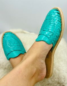 Casual Mules With Textured Sole, Casual Everyday Mules With Textured Sole, Green Casual Mules With Leather Footbed, Casual Green Mules With Leather Sole, Casual Slide Mules With Stitched Sole, Casual Leather Slide Slip-ons, Casual Adjustable Huarache Sandals With Removable Insole, Casual Adjustable Closed Toe Mules, Green Casual Huaraches With Round Toe