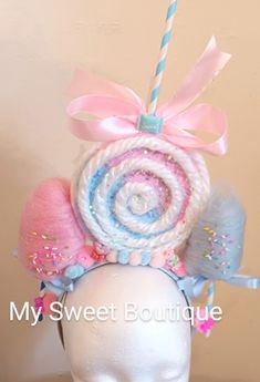 Lollipop and Cotton Candy together!! 💞 This lollipop headband can be made to fit kids and Adults!!  Choose from either a light blue headband or light pink.  🍭 The lollipop is done in two shades, light pink and light blue.  With white swirls and chunky glitter that is sealed.  🍭 The lollipop will have a straw/stick ( the stick is inside the straw for extra durability ) on top and a satin pink bow. 🍭 The two mini cotton candies are in light pink and light blue and come with  Colorful sprinkles and glitter.    🍬🍬 You will also find some adorable fake candies.   The fake candies will vary. 🍭 The lollipop portion measures 5 in high and wide.     If you measure to the tippy top of the stick it is approximately 11 inches high. Each one is made with care and the cotton candies are also hand Candy Hats, Animations Character, Cotton Candy Halloween Costume, Lollipop Costume, Light Blue Headband, Short Bleached Hair, Cheshire Cat Costume, Candy Clothes, Candy Makeup