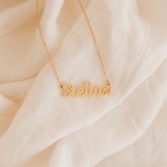 Give a meaningful gift to your child that they will wear every day with our Custom Kid’s Name Necklace. Both dainty and minimalist, this necklace can be personalized with any name and can even include cute symbols to make this jewelry piece more unique. Material: High-Quality Solid 925 Sterling Silver Finish: Sterling Silver ∙ 18K Gold ∙ Rose Gold Dimensions: Depending on your font choice, height sizes range from 3mm to 4mm lowercase SKU: HH-NH02F87 Minimalist Name Necklace For Birthday Gift, Minimalist Personalized Charm Necklaces For Birthday Gift, Minimalist Personalized Charm Necklace For Birthday, Minimalist Custom Name Charm Necklace As Gift, Customizable Everyday Nameplate Necklace, Minimalist Personalized Necklace For Birthday Gift, Everyday Customizable Nameplate Necklace, Customized Adjustable Necklace For Everyday, Customized Adjustable Necklaces For Everyday