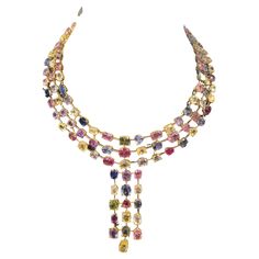 Multi-Colored Sapphire Necklace Features 142 sapphires in a variety of colors totaling 137.40 cts 18K Yellow Gold Measurements: 18 inches long Multi Sapphire Necklace, Multi Colored Jewelry, Heart Shaped Diamond Necklace, Goth Wardrobe, Pink Gold Necklace, Colored Jewelry, Lily Necklace, Sapphire And Diamond Earrings, Multicolor Jewelry