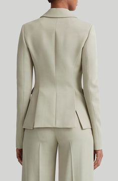 This tailored-fit blazer made from a wool-enriched crease-resistant fabric is framed by signature structured shoulders. 27" length (size 8US/40FR) Two-button closure Notched lapels Chest welt pocket; front flap pockets Side vents Lined 86% viscose, 14% wool Dry clean Made in Italy Designer Clothing Designer Blazer With Concealed Front Fastening, Elegant Structured Blazer With Concealed Placket, Chic Structured Blazer With Boning, Designer Formal Blazer With Concealed Front Fastening, Fitted Blazer With Structured Boning For Spring, Notch Lapel Blazer With Concealed Front Fastening, Elegant Blazer With Notch Lapel And Concealed Fastening, Structured Blazer With Hidden Button Closure, Chic Fitted Blazer With Structured Boning