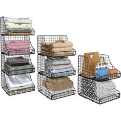 three metal baskets with folded towels and blankets