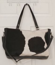 Cowhide hospital bag Ladies Shoulder Purse - Pure Cowhide Leather Bag -Dome closure-One inside zipped pocket-Two phone/card pockets Rectangular Cow Print Travel Bag, Black Bag With Cow Print For Everyday Use, Cow Print Leather Bag For Daily Use, Leather Cow Print Bag For Everyday Use, Black Calf Hair Shoulder Bag For Everyday Use, Black Calf Hair Bag With Leather Handles, Black Calf Hair Bags For Everyday Use, Black Calf Hair Bag For Everyday Use, Everyday Black Calf Hair Bag