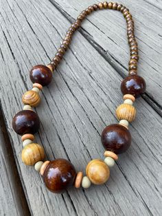 Hand crafted chunky wooden bead necklace made with premium beads. You can dress this up or wear with your favorite t-shirt and jeans. It's a fun grab and go necklace for any occasion and adds a touch of flare to pull it all together! For sure to be one of your favorite pieces! Wooden Beaded Necklace, African Necklaces, Wooden Bead Jewelry, Wood Beads Jewelry, Wooden Bead Necklace, Driftwood Jewelry, African Accessories, Wooden Bead Necklaces, African Necklace