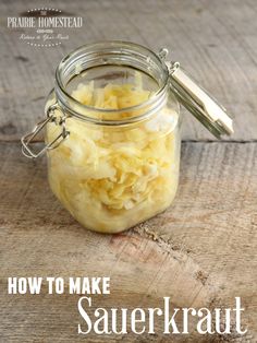 how to make sauerkraut in a glass jar on a wooden table with text overlay