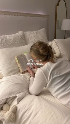 a woman laying in bed with her head on the pillow and reading a book that reads after school