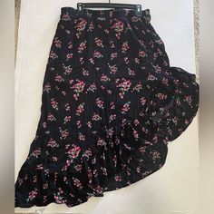 New With Tags Black Floral Print Asymmetrical Skirt And Crop Top Set Size Xl 100% Polyester Pit To Pit 22” Top Length 17” Waist 36” Length 34” Black Wrap Skirt With Asymmetrical Hem, Black Asymmetrical Ruffled Wrap Skirt, Black Tiered Wrap Skirt For Spring, Black Midi Wrap Skirt For Summer, Black Fitted Maxi Skirt With Asymmetrical Hem, Black Asymmetrical Hem Lined Skirt, Black Skirt With Ruffled Asymmetrical Hem, Casual Black Skirt With Asymmetrical Hem, Black Tiered Wrap Skirt With Lining