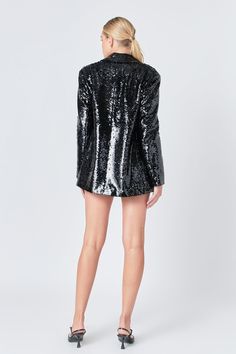 This Sequin Oversized Jacket is a chic addition to your wardrobe. Featuring a taffeta peaked lapel and V neckline this jacket is sparkly and eye-catching with its sequin embellishments. The long sleeves make it a perfect option for a night out or special occasion. This statement piece is sure to make you stand out. Enhance your style and make a statement with this Sequin Oversized Jacket! Sequins Taffeta peaked lapel V neckline Long sleeves Shoulder pads Contrast fake flap pocket Front button cl Evening Outerwear With Contrast Sequin And Long Sleeves, Chic Sequined Evening Outerwear, Glamorous Sequined Outerwear For Party, Chic Sequined Outerwear For Evening, Glamorous Sequin Outerwear For Evening, Evening Long Sleeve Outerwear With Contrast Sequin, Glamorous Sequined Evening Outerwear, Evening Long Sleeve Contrast Sequin Outerwear, Chic Embellished Long Sleeve Blazer