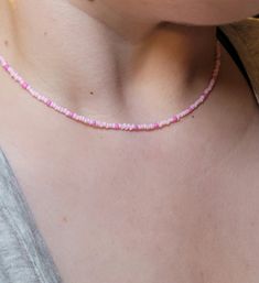 This handmade necklace is from out Minimalist collection - Blossom is one of many colour variations Everyday Round Beads Necklace With Spacer Beads, Everyday Necklace With Spacer And Round Beads, Handmade Minimalist Pink Necklaces, Handmade Minimalist Pink Necklace, Pink Handmade Minimalist Necklaces, Pink Handmade Minimalist Necklace, Handmade Choker For Everyday Use, Minimalist Handmade Pink Necklace, Pink Beaded Dainty Choker