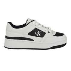 Navigate through the day in style and comfort wearing the Calvin Klein Alondra sneakers. Retro-inspired, these athletic sneakers are made with an iconic monogram logo on the side and a lace-up front. Founded in New York in 1968, the brand elevates everyday essentials to globally iconic status. | Calvin Klein Women's Alondra Casual Platform Lace Up Sneakers, 9M White Low-top Platform Sneakers With Logo Detail, Modern Platform Lace-up Sneakers With Logo Print, White Low-top Chunky Sneakers With Logo, Modern Low-top Sneakers With Logo Print, Lace-up Sports Sneakers With Logo, Classic Lace-up Sneakers With Logo Print, White Chunky Sneakers With Logo And Round Toe, White Sole Lace-up Chunky Sneakers With Logo, Modern Lace-up Platform Sneakers With Logo