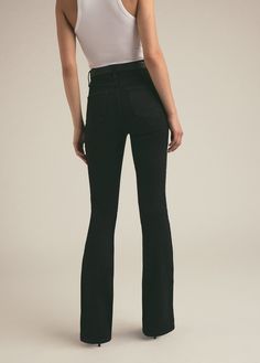 A high five for the super high rise 11.5" bootcut jeans. The retro-inspired style of the black Kyoto wash gives the Valentina a sophisticated look and the stretch gives this denim a well-fitted silhouette. (Gentle fading from a tumbled rinse plus Favorite Daughter embroidery on the back waistband, of course.) 98% Cotton, 2% Elastane Machine Wash Cold Rise / Waist: extreme high rise / pinched Hips: fitted at hips Leg: slim mini boot Average Height: full length 11.5" rise 14.25" knee16.5" leg open High Rise Flare Jeans For Fall, Modern Straight Leg Jeans For Night Out, High Rise Jeans For Night Out, Chic Full Length Flare Jeans For Night Out, Modern High Rise Flare Jeans, Chic High Rise Flare Jeans With Five Pockets, Spring High Rise Black Flares, Trendy Black Straight Leg Flares, Modern High Rise Flare Jeans For Fall